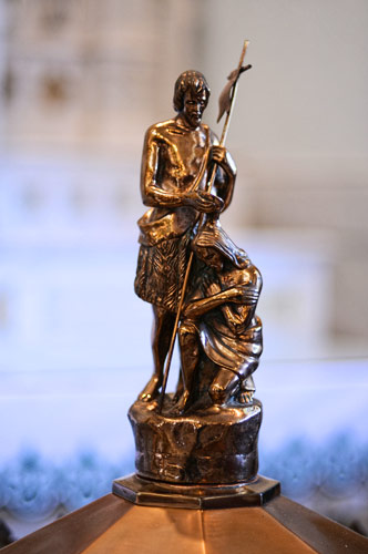 Small statue of Jesus and St. John the Baptist on the Baptismal Font